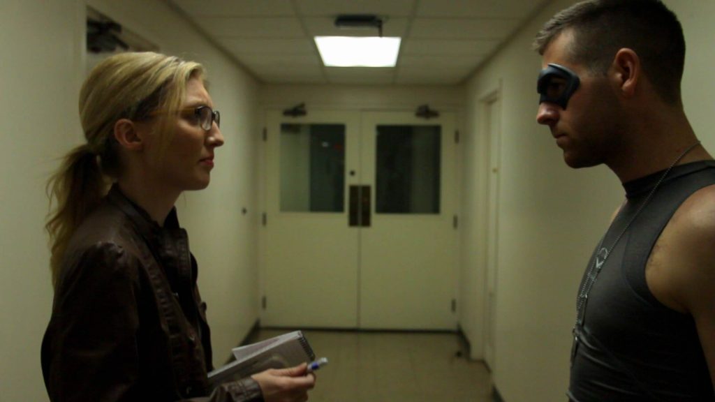 Justice and Shirley in the hallway